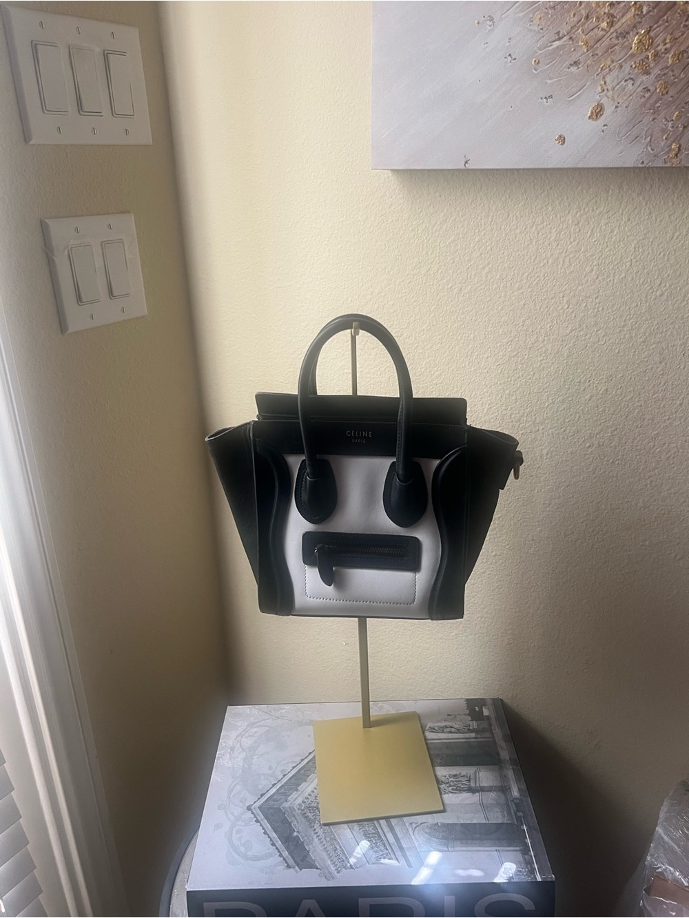 Céline Nano in Fair condition has a missing rivet on one side and makeup inside!